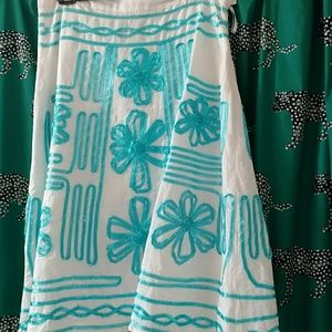 White linen skirt with turquoise ribbon detail